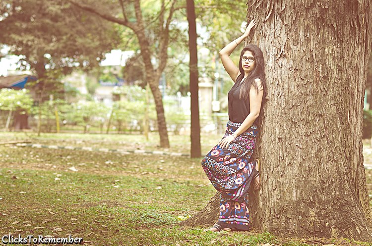 Model leaning on a tree Outdoor Model Photography in Bangalore