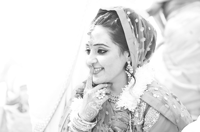 Candid photograph of a beautiful bride Candid Wedding Photographers in Udaipur Bhilwara Banswara & Dungarpur